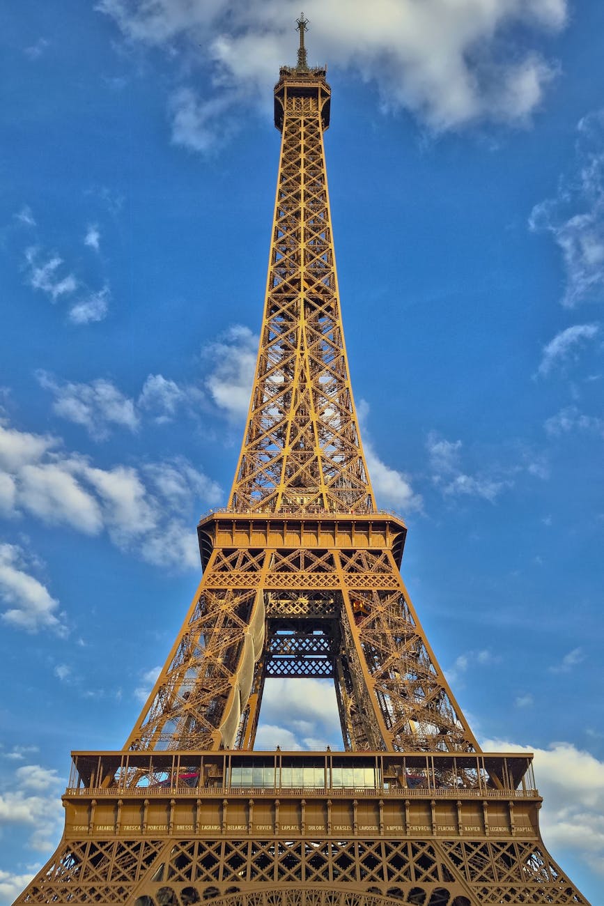 eiffel tower against blue sky in paris